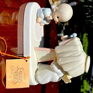 Precious Moments “Baby’s First Picture” ceramic figurine